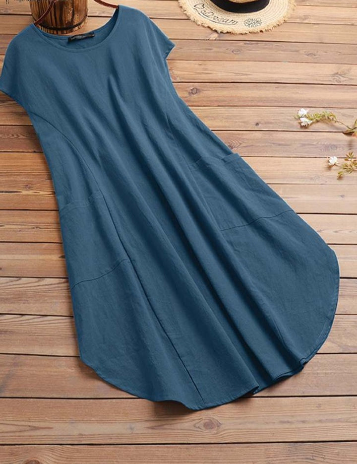 שמלת אוברסייז רחבה ונשפכת על הגוף מעוטרת כיסים nobu