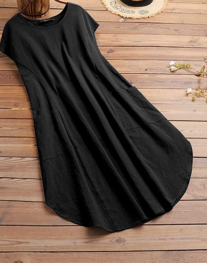 שמלת אוברסייז רחבה ונשפכת על הגוף מעוטרת כיסים nobu