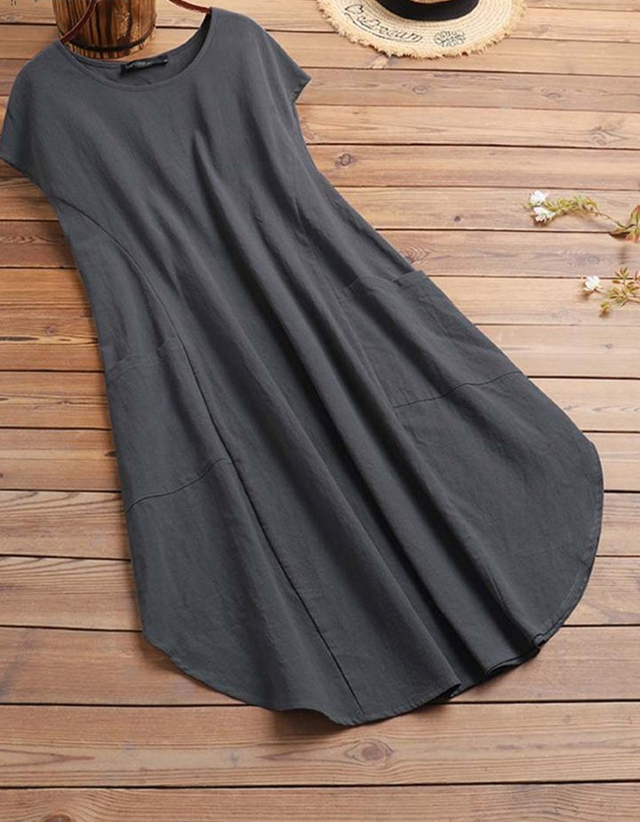 שמלת אוברסייז רחבה ונשפכת על הגוף מעוטרת כיסים nobu